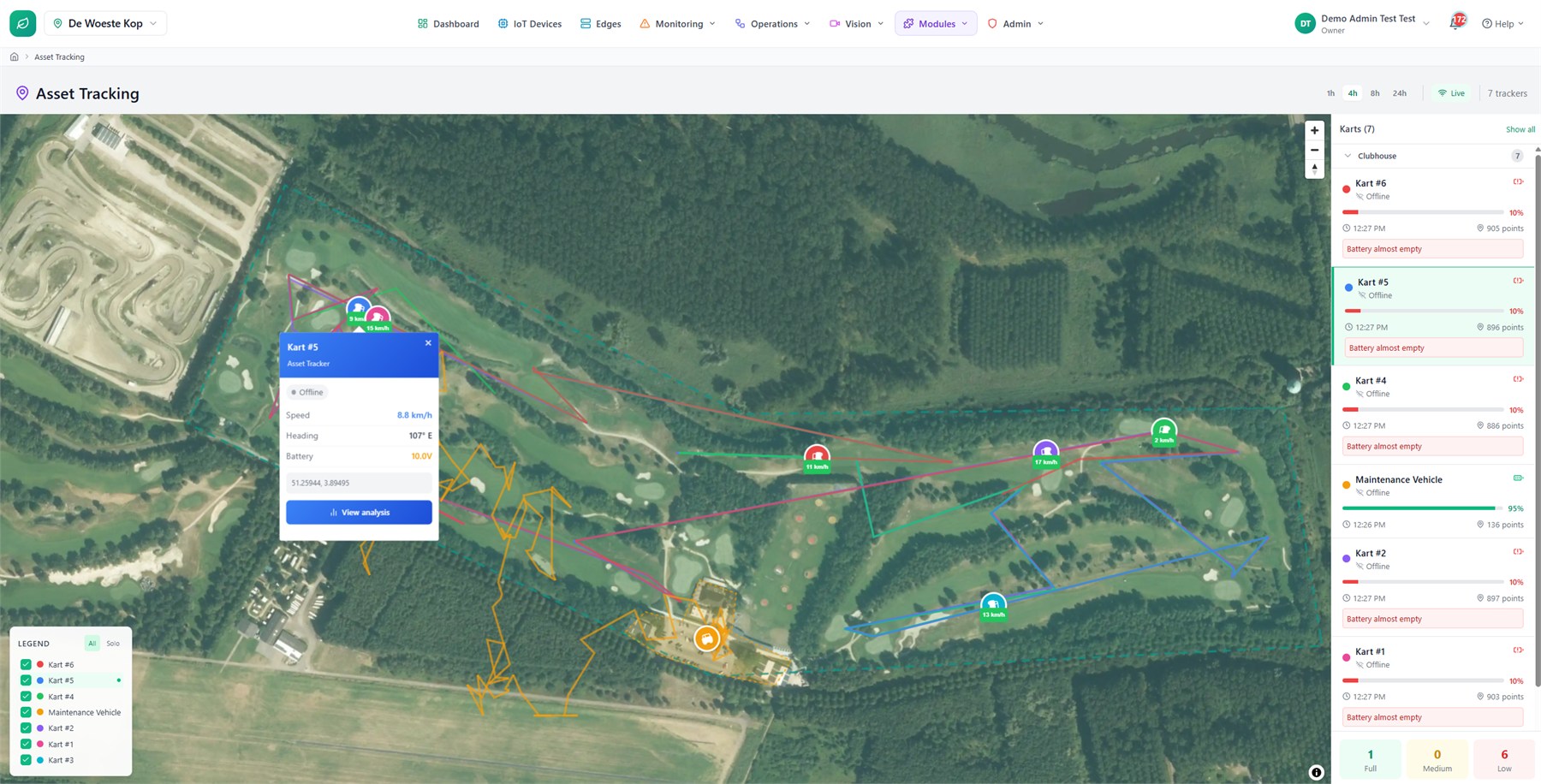 Map view with drawn geofence zones and tracked assets moving across them, listing recent enter and exit alerts.